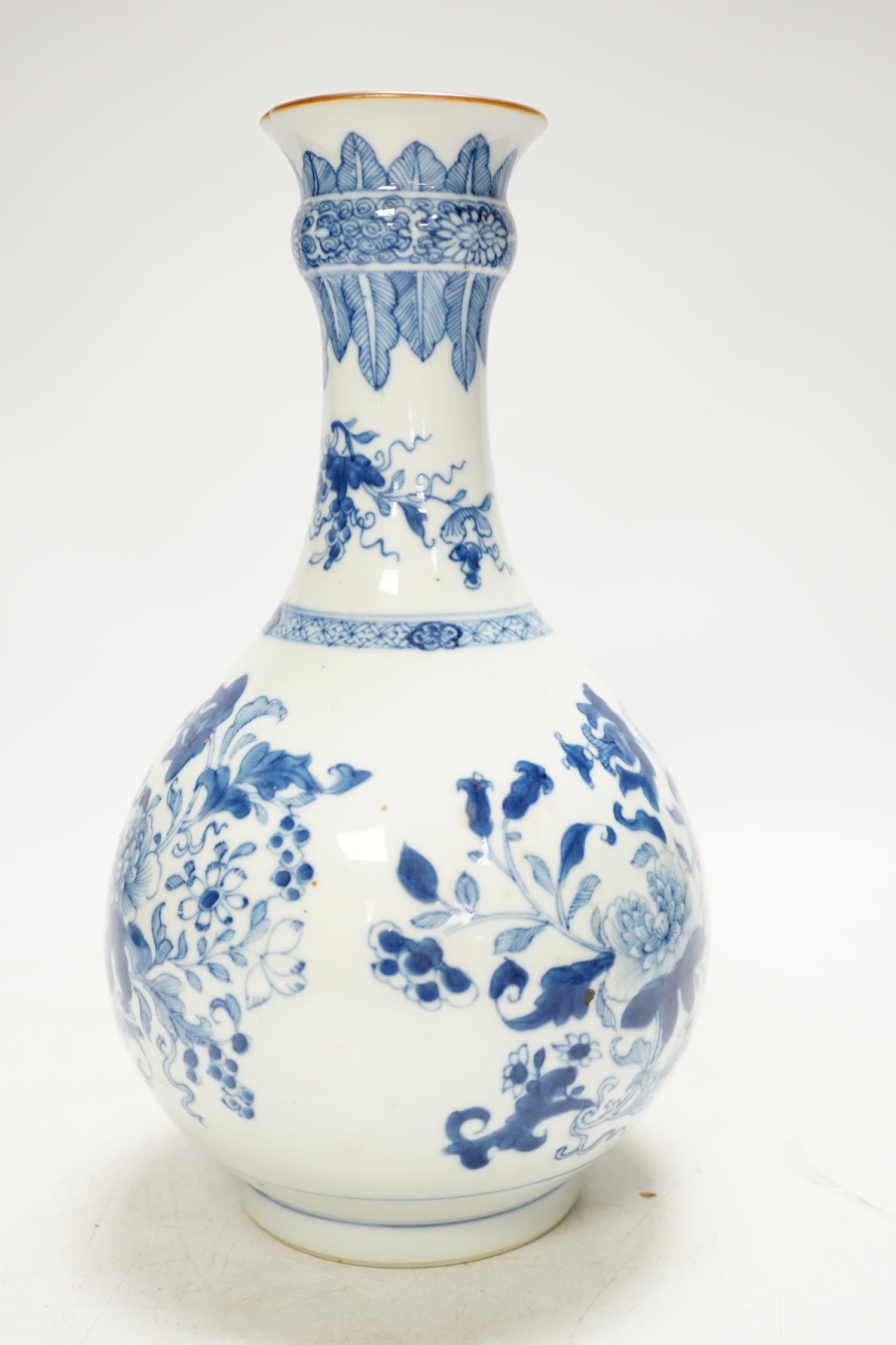 A 18th century Chinese blue and white bottle vase (guglet), 25cm. Condition - good